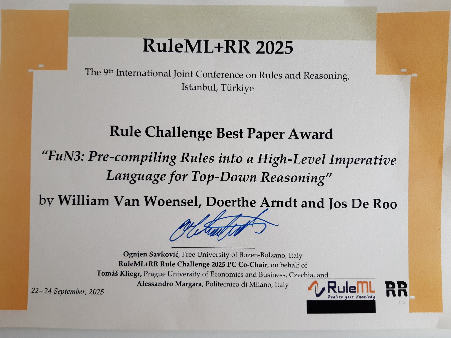 A picture of the award, which is a paper mentioning the conference, paper title, award title, and the authors.